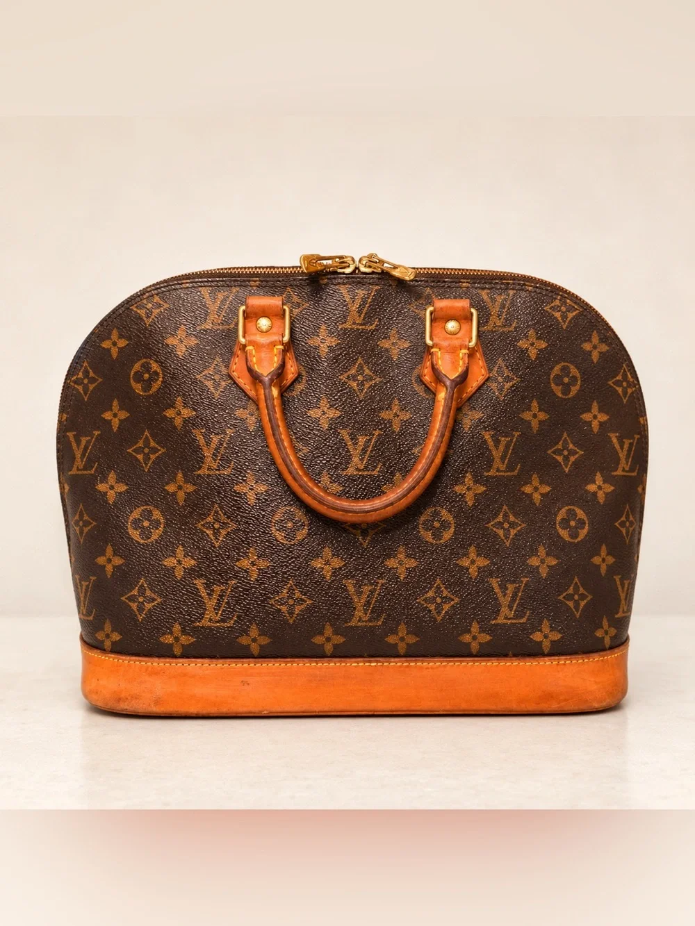 Louis Vuitton Brown Monogram Alma Satchel with Tan Trim